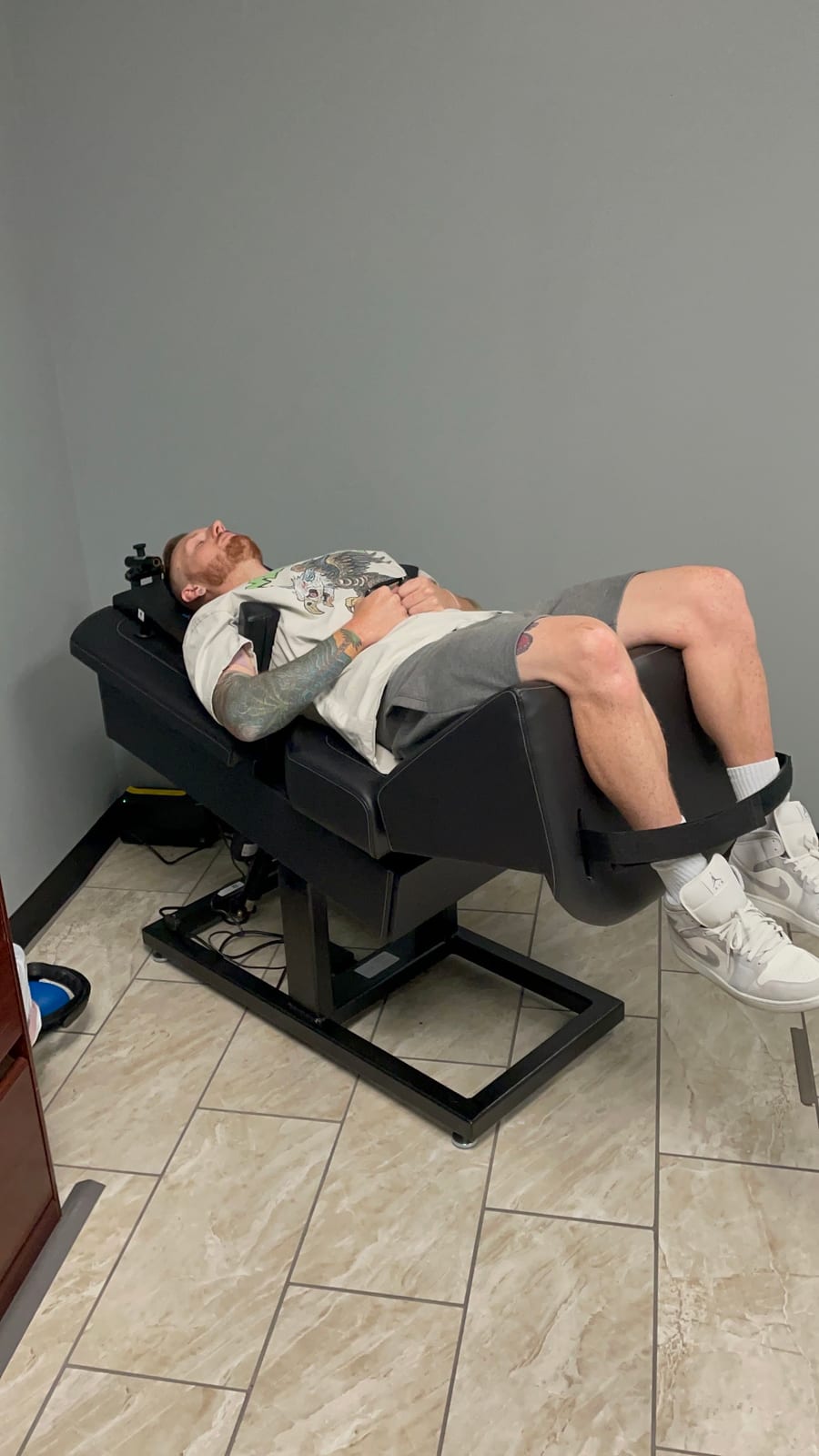 A patient reclined in the treatment chair